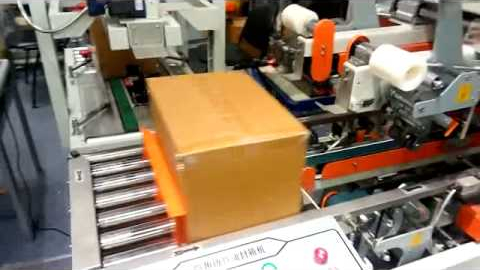 Заклейка коробов на станке FXJ-6050